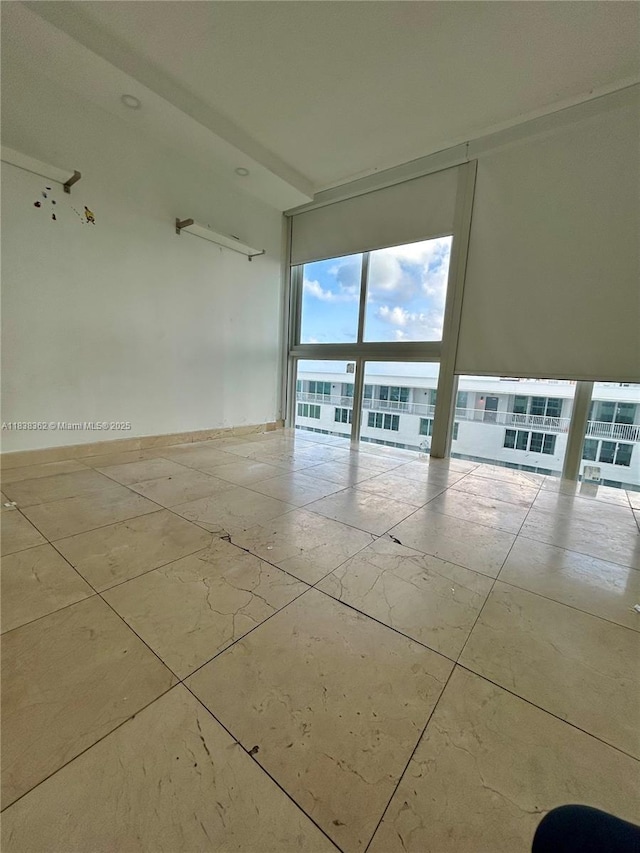 5401 Collins Ave Unit 514, Miami Beach, FL 33140 - unfurnished room with expansive windows