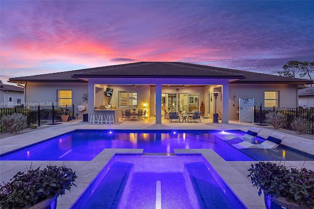 11971 Torreyanna, West Palm Beach, FL 33412 - view of swimming pool featuring a pool with connected hot tub, ceiling fan, and a patio