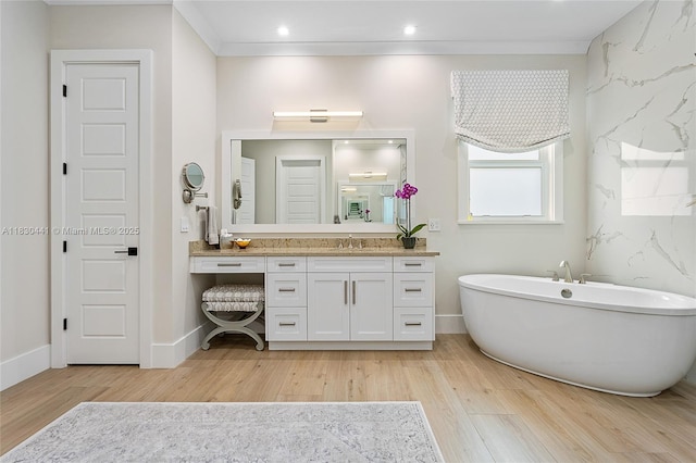 11971 Torreyanna, West Palm Beach, FL 33412 - full bathroom with wood finished floors, a freestanding bath, and vanity