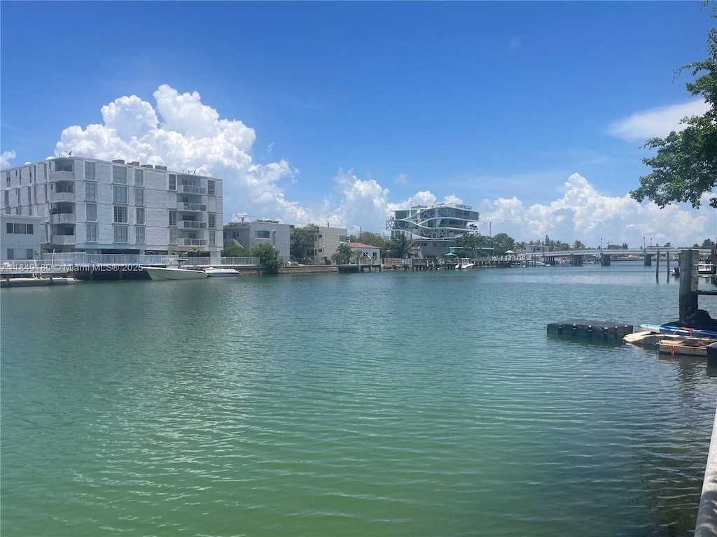 8300 Byron Ave Unit 5, Miami Beach, FL 33141 - water view featuring a dock