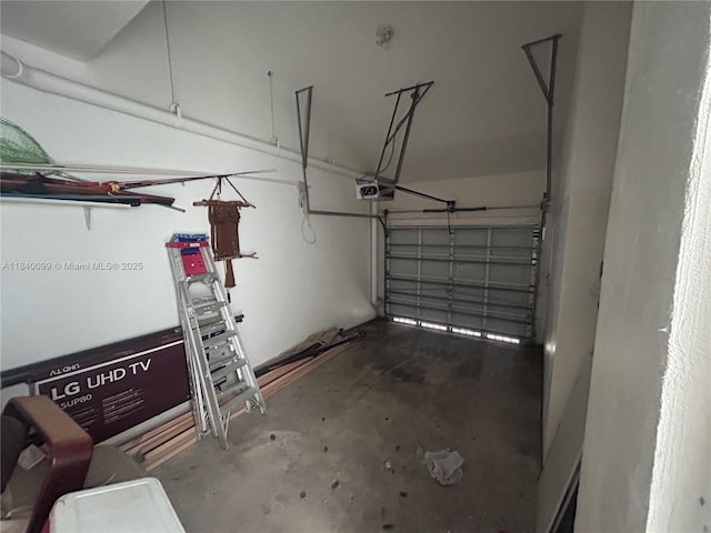 324 Poinciana Dr Unit 906, Sunny Isles Beach, FL 33160 - garage with a garage door opener