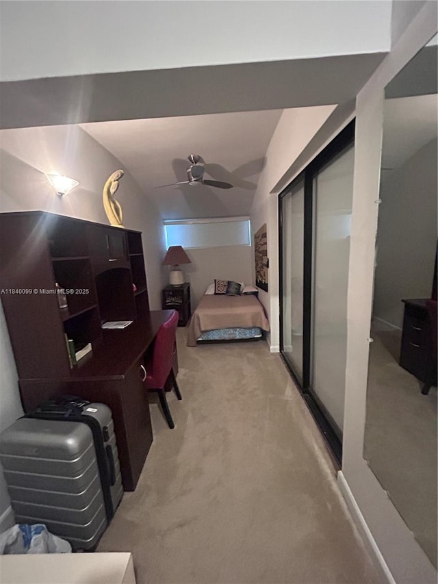 324 Poinciana Dr Unit 906, Sunny Isles Beach, FL 33160 - bedroom with light carpet, vaulted ceiling, ceiling fan, and a closet