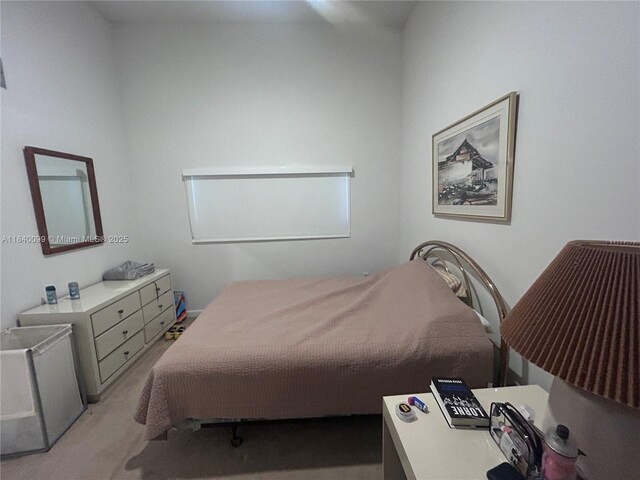 324 Poinciana Dr Unit 906, Sunny Isles Beach, FL 33160 - bedroom featuring light colored carpet