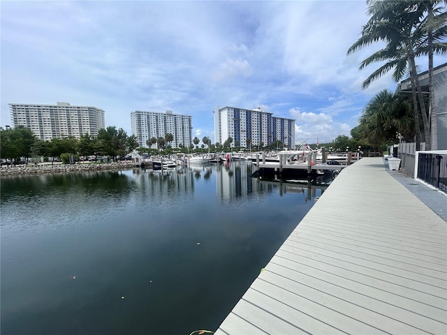 324 Poinciana Dr Unit 906, Sunny Isles Beach, FL 33160 - dock area featuring a water view and a view of city