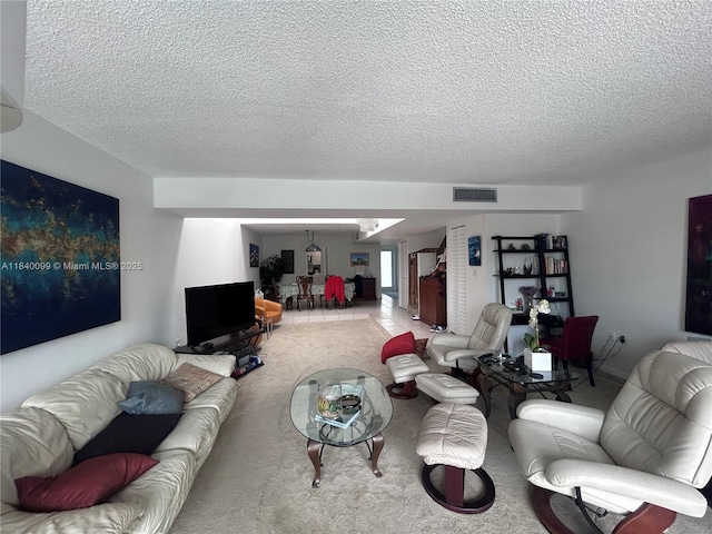 324 Poinciana Dr Unit 906, Sunny Isles Beach, FL 33160 - living area with a textured ceiling