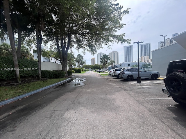 324 Poinciana Dr Unit 906, Sunny Isles Beach, FL 33160 - view of asphalt street with a view of skyline