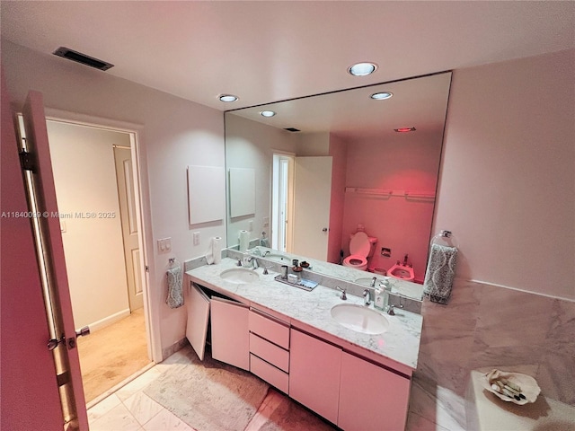 324 Poinciana Dr Unit 906, Sunny Isles Beach, FL 33160 - full bath with double vanity, recessed lighting, and a walk in closet