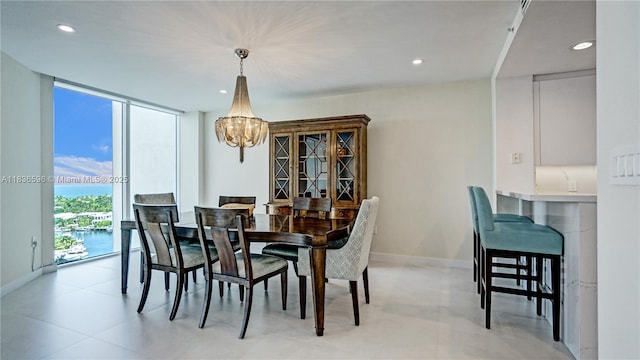 20201 E Country Club Dr Unit 1202, Aventura, FL 33180 - dining space featuring a chandelier, recessed lighting, and expansive windows