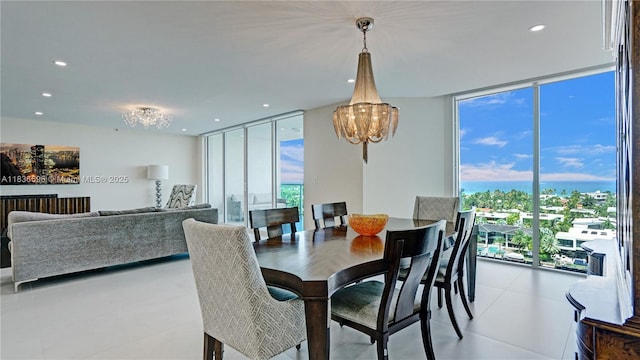 20201 E Country Club Dr Unit 1202, Aventura, FL 33180 - dining room with expansive windows, a chandelier, and recessed lighting