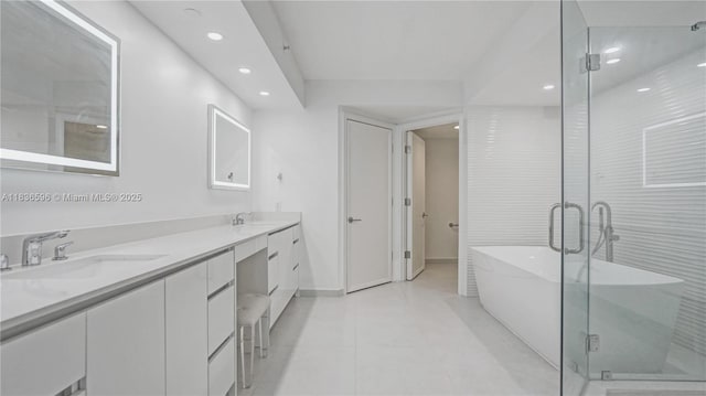 20201 E Country Club Dr Unit 1202, Aventura, FL 33180 - bathroom featuring recessed lighting, a soaking tub, double vanity, a shower stall, and tile patterned floors