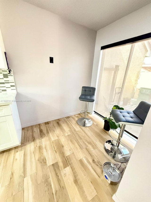 6169 NW 170th Ter, Hialeah, FL 33015 - unfurnished room featuring light wood-style flooring and baseboards