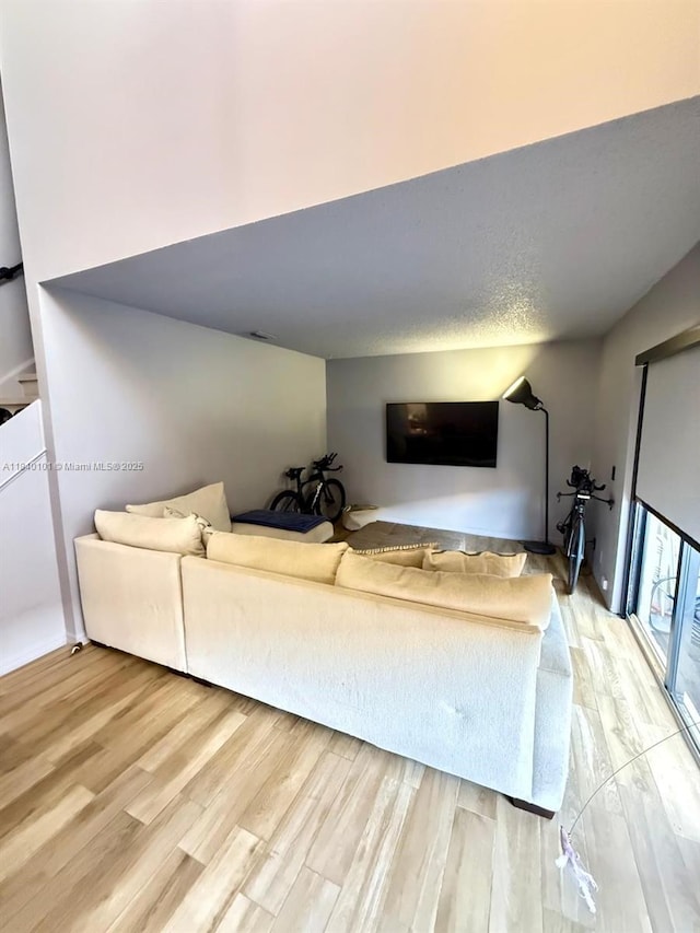 6169 NW 170th Ter, Hialeah, FL 33015 - living room with light wood-style flooring