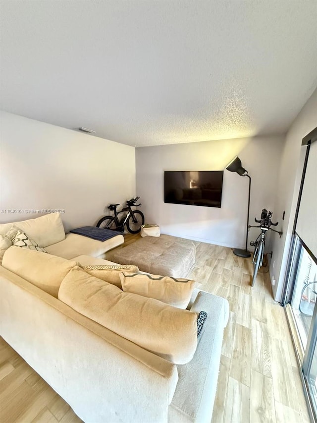 6169 NW 170th Ter, Hialeah, FL 33015 - living area featuring wood finished floors