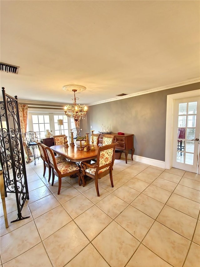 9057 SW 157th Path, Miami, FL 33196 - dining room with ornamental molding, a chandelier, and light tile patterned flooring