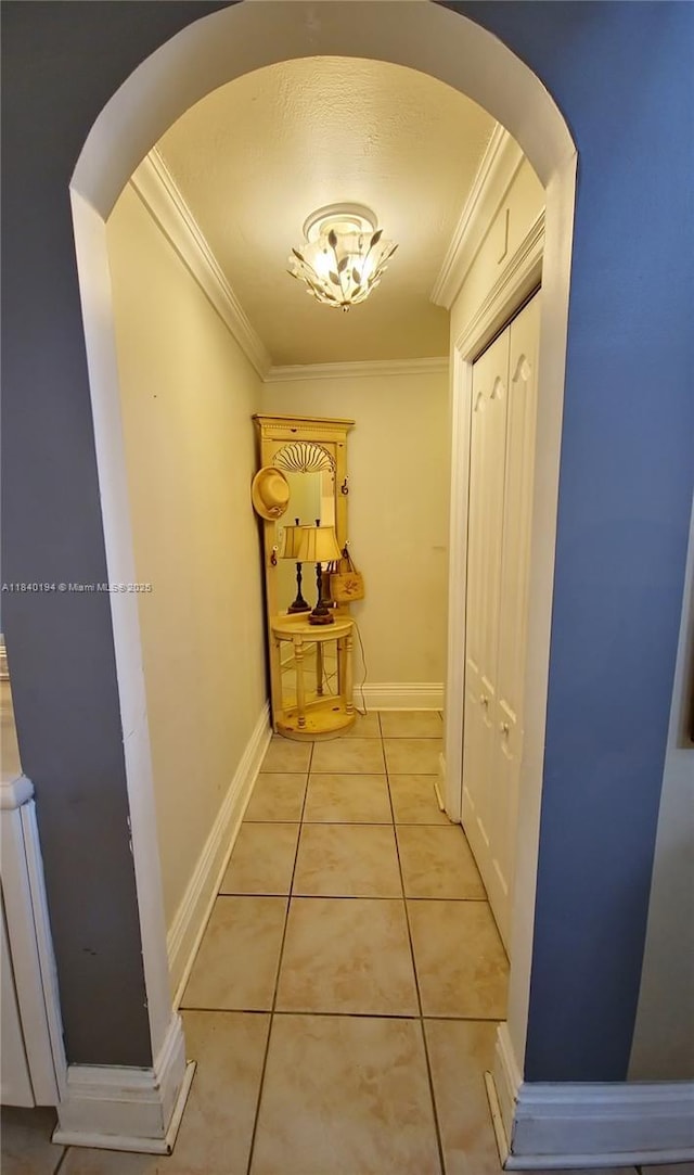9057 SW 157th Path, Miami, FL 33196 - hallway with crown molding, light tile patterned floors, and arched walkways