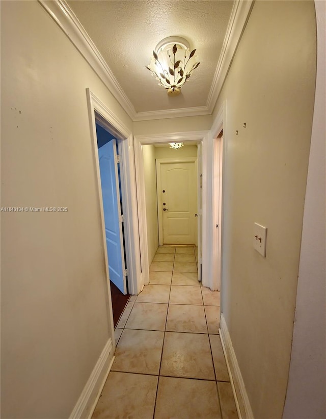 9057 SW 157th Path, Miami, FL 33196 - hall featuring crown molding, light tile patterned flooring, and a textured ceiling