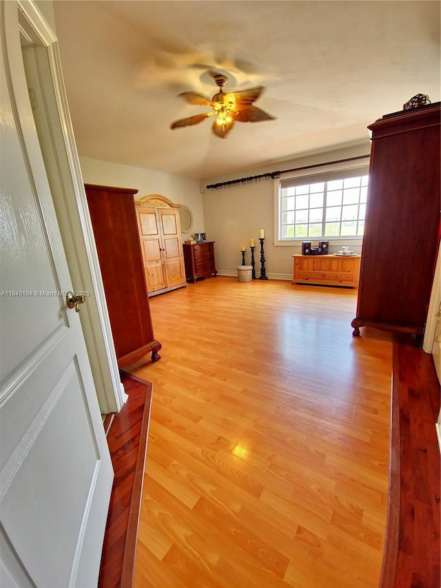 9057 SW 157th Path, Miami, FL 33196 - spare room featuring a ceiling fan and light wood finished floors