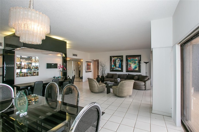 1800 NE 114th St Unit Ph06, Miami, FL 33181 - dining area featuring a chandelier and light tile patterned floors