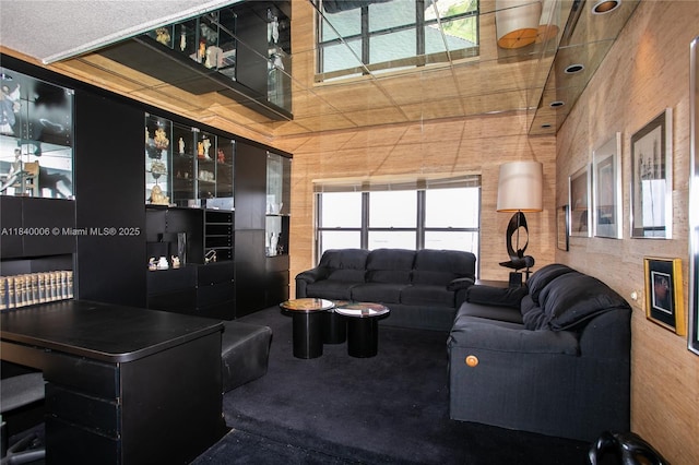 1800 NE 114th St Unit Ph06, Miami, FL 33181 - carpeted living area with a towering ceiling