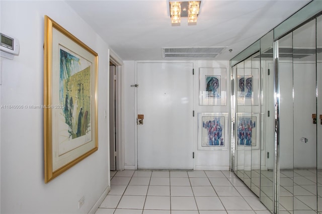 1800 NE 114th St Unit Ph06, Miami, FL 33181 - hall featuring a chandelier and light tile patterned floors