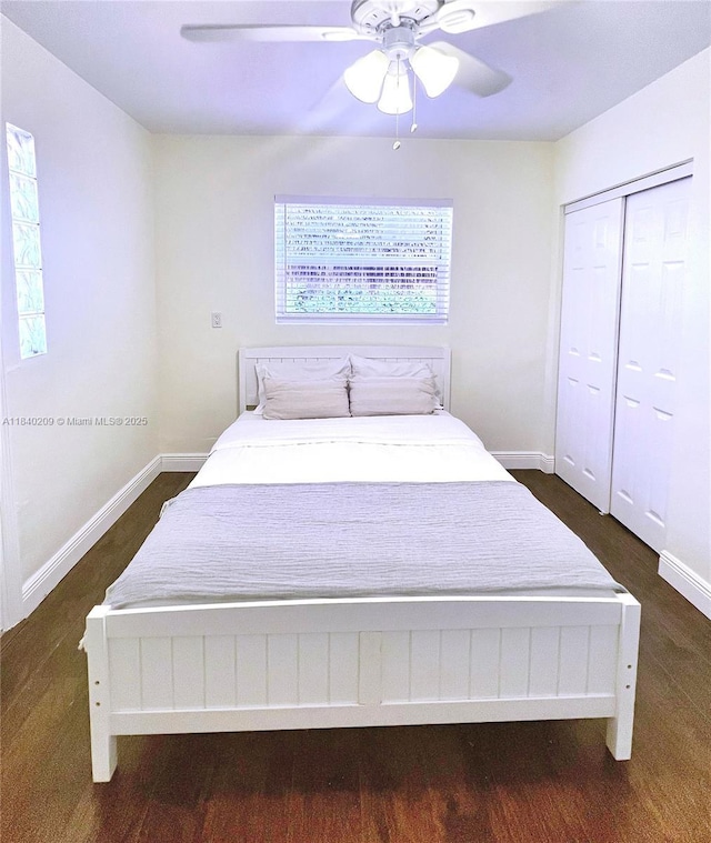 9130 SW 17th Ter, Miami, FL 33165 - bedroom featuring a ceiling fan, a closet, and dark wood-style floors