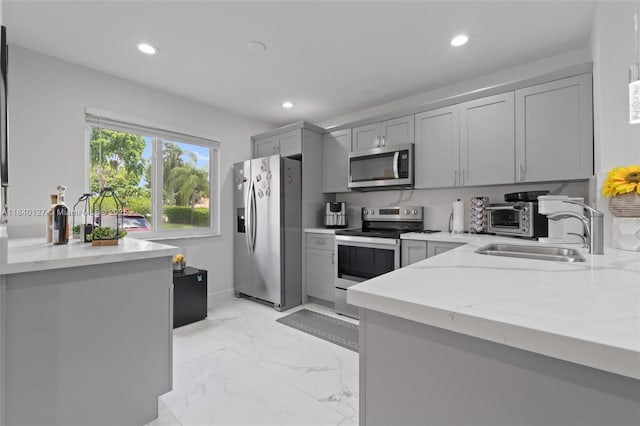 6348 Walk Cir, Boca Raton, FL 33433 - kitchen with stainless steel appliances, gray cabinets, recessed lighting, light stone countertops, and light marble finish flooring