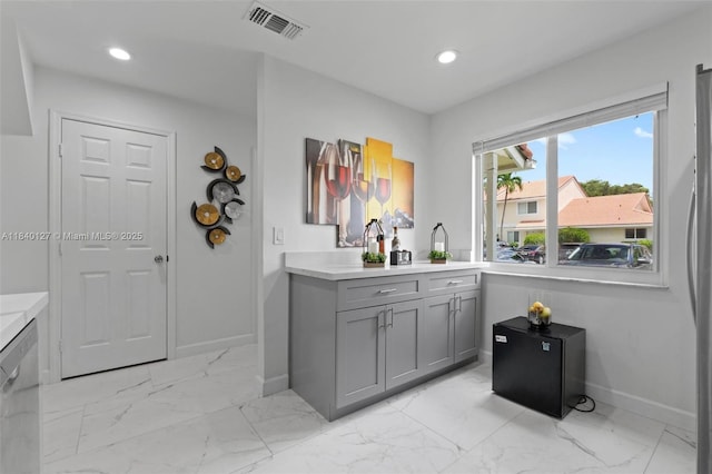 6348 Walk Cir, Boca Raton, FL 33433 - kitchen featuring gray cabinetry, light marble finish floors, recessed lighting, and light countertops