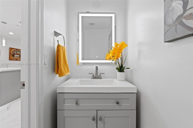 6348 Walk Cir, Boca Raton, FL 33433 - bathroom with vanity and marble finish floors