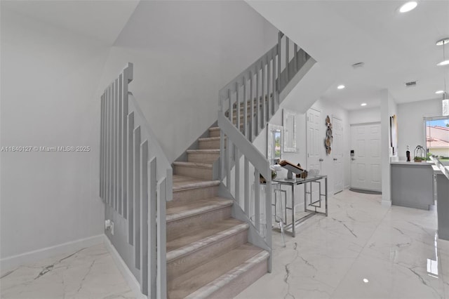 6348 Walk Cir, Boca Raton, FL 33433 - staircase featuring recessed lighting and marble tiled floors