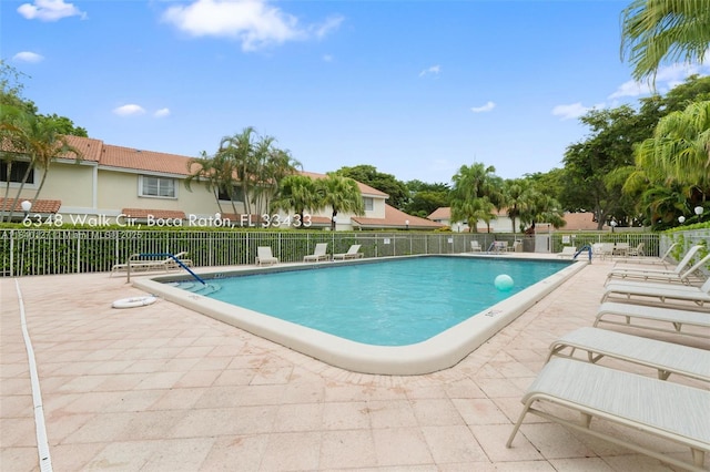6348 Walk Cir, Boca Raton, FL 33433 - community pool featuring a patio