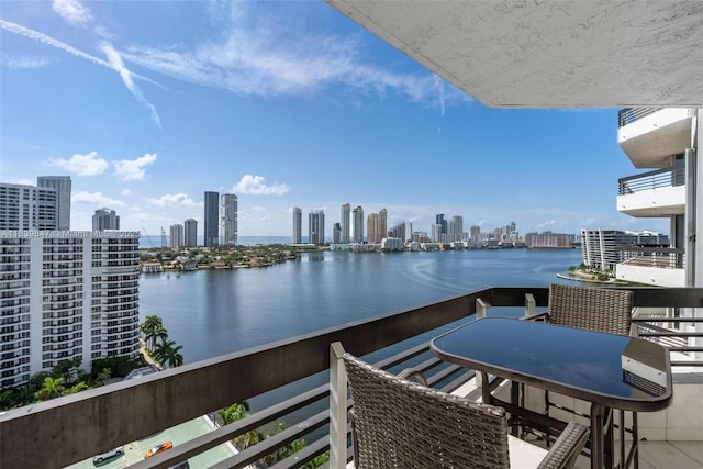 3530 Mystic Pointe Dr Unit 2014, Aventura, FL 33180 - balcony with a view of skyline and a water view