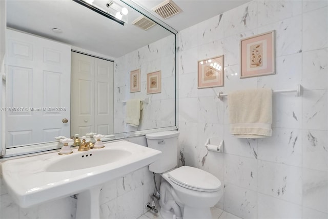 3530 Mystic Pointe Dr Unit 2014, Aventura, FL 33180 - bathroom with tile walls and toilet