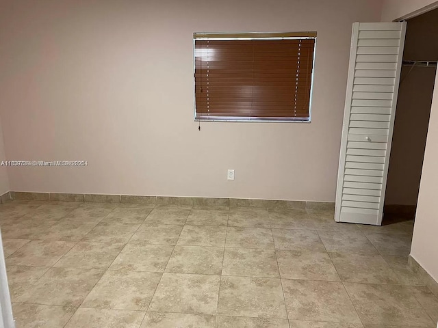 3690 N 56th Ave Unit 916, Hollywood, FL 33021 - unfurnished bedroom featuring baseboards