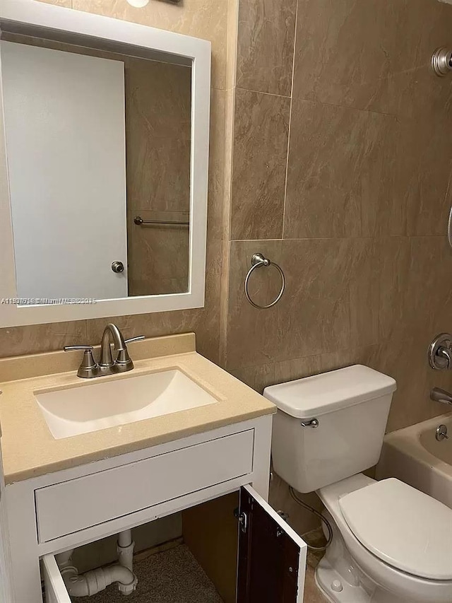 3690 N 56th Ave Unit 916, Hollywood, FL 33021 - bathroom with tile walls, vanity, and shower / bath combination