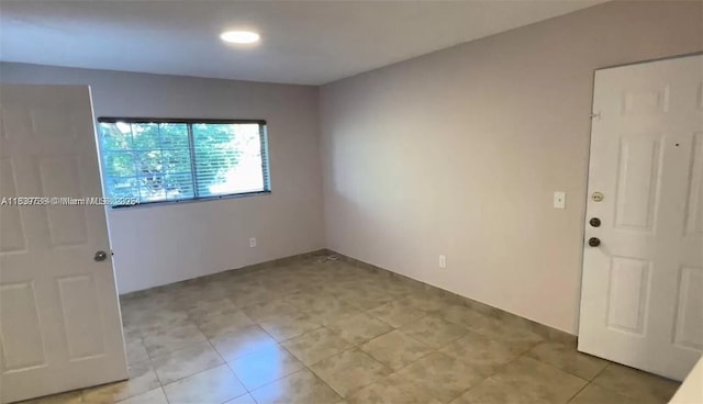 3690 N 56th Ave Unit 916, Hollywood, FL 33021 - empty room with light tile patterned floors and recessed lighting