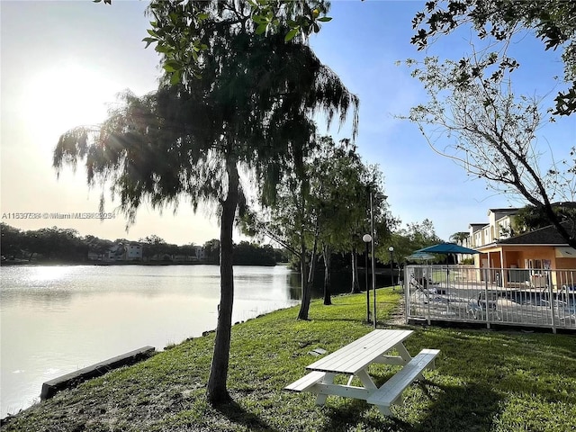 3690 N 56th Ave Unit 916, Hollywood, FL 33021 - view of home's community with a yard and a deck with water view