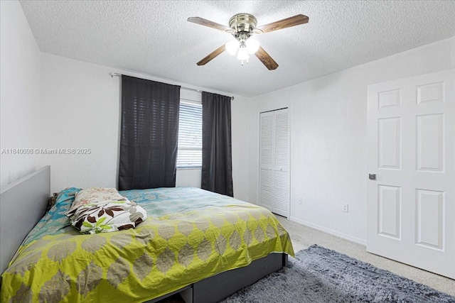 13063 NW 11th Ct, Sunrise, FL 33323 - carpeted bedroom with a closet, a textured ceiling, and ceiling fan