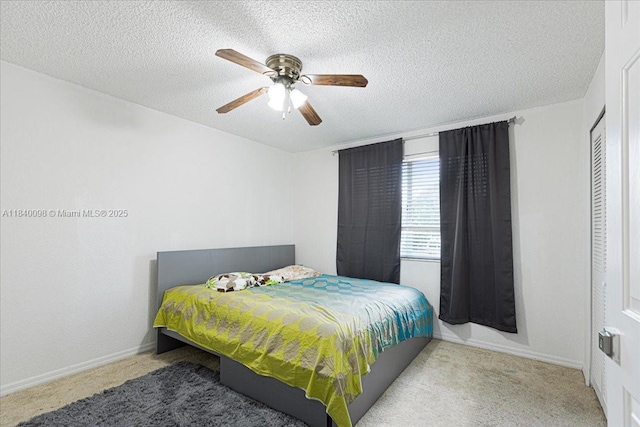 13063 NW 11th Ct, Sunrise, FL 33323 - bedroom featuring carpet flooring, a textured ceiling, and ceiling fan