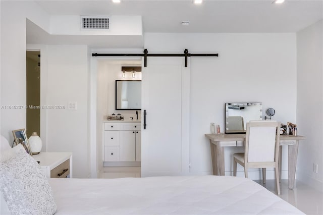 16479 NE 27th Pl Unit 16, North Miami Beach, FL 33160 - bedroom featuring a barn door and recessed lighting