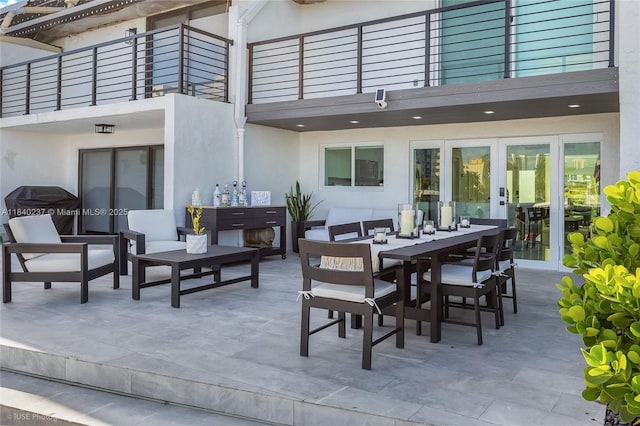16479 NE 27th Pl Unit 16, North Miami Beach, FL 33160 - patio / terrace featuring outdoor lounge area, french doors, a patio area, and outdoor dining space