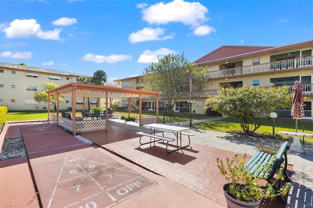 5300 Washington St Unit Q207, Hollywood, FL 33021 - view of home's community featuring shuffleboard and a yard