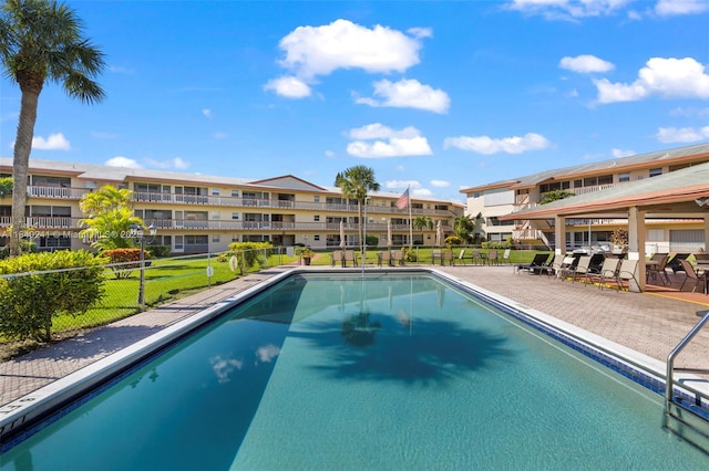 5300 Washington St Unit Q207, Hollywood, FL 33021 - community pool featuring a patio