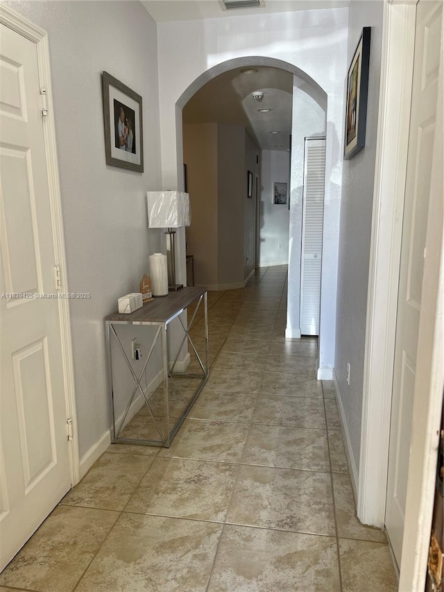 730 SE 34th Ave, Homestead, FL 33033 - corridor with arched walkways and baseboards