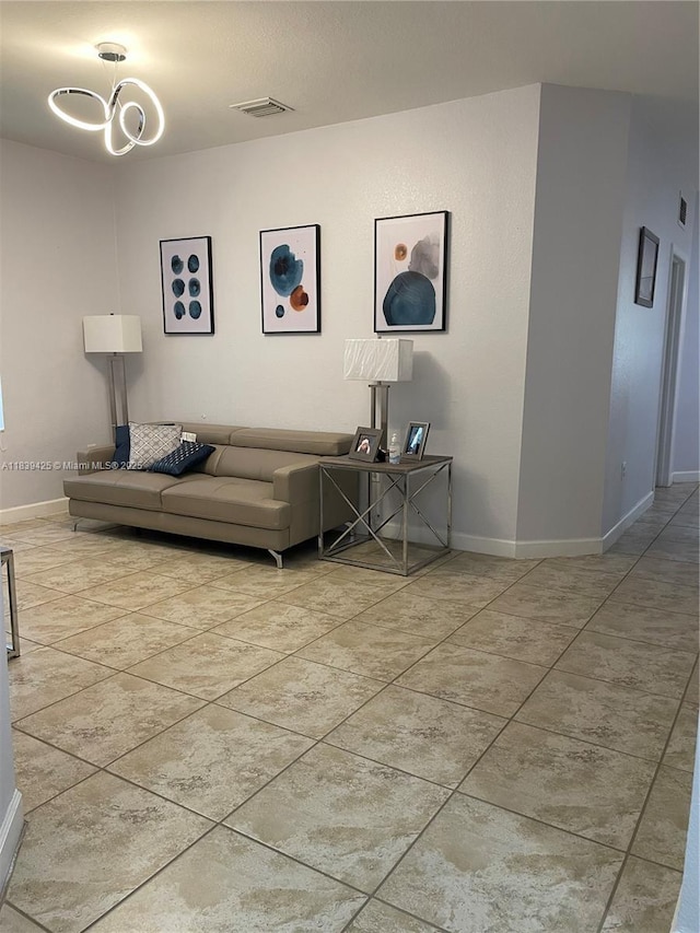 730 SE 34th Ave, Homestead, FL 33033 - living area with a chandelier and baseboards