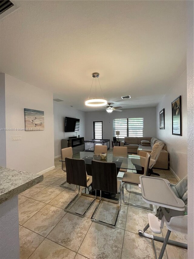 730 SE 34th Ave, Homestead, FL 33033 - dining room featuring baseboards and ceiling fan