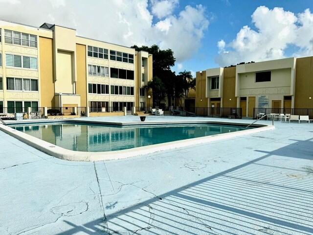 6911 SW 147th Ave Unit 3C, Miami, FL 33193 - community pool featuring a patio