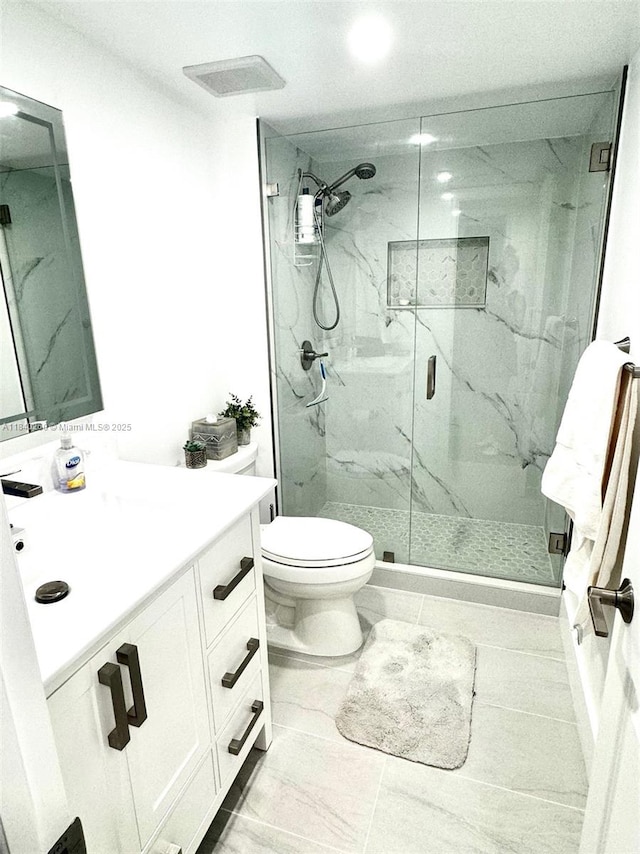 6911 SW 147th Ave Unit 3C, Miami, FL 33193 - full bathroom with vanity, a marble finish shower, marble look tiles, and recessed lighting