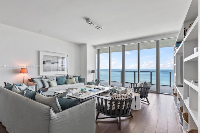360 Ocean Dr Unit 704S, Key Biscayne, FL 33149 - living room featuring a water view, a wall of windows, and hardwood / wood-style flooring