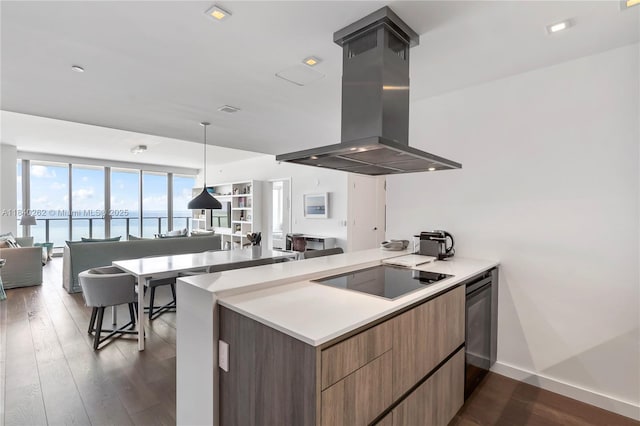 360 Ocean Dr Unit 704S, Key Biscayne, FL 33149 - kitchen with black electric cooktop, island exhaust hood, modern cabinets, open floor plan, and dark wood-style floors