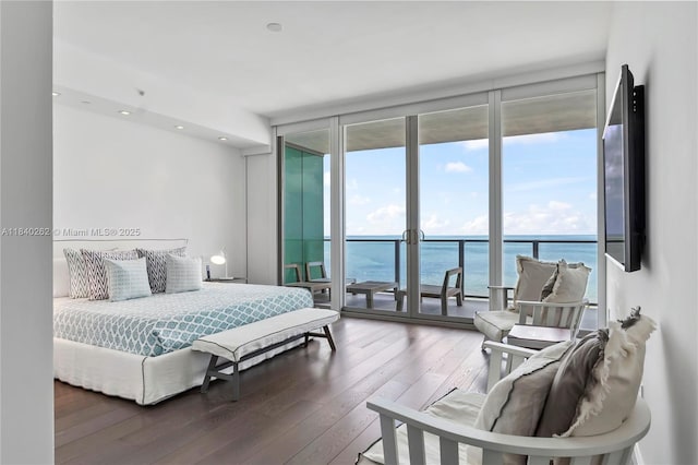 360 Ocean Dr Unit 704S, Key Biscayne, FL 33149 - bedroom with floor to ceiling windows, access to outside, hardwood / wood-style floors, and recessed lighting